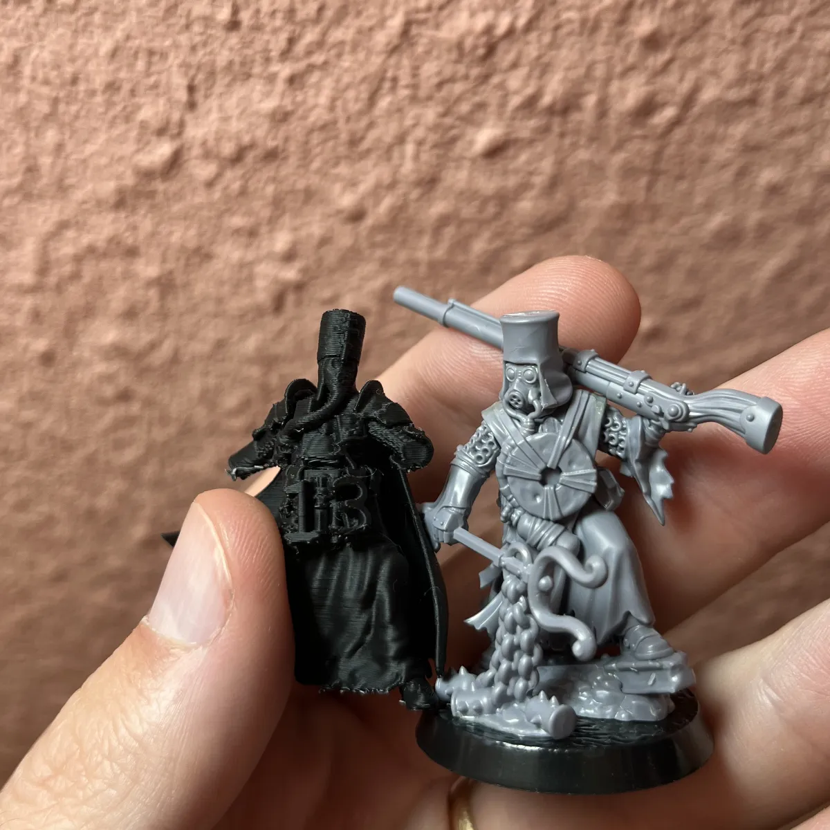 Test print marked 13 beside a plastic Trench Pilgrim