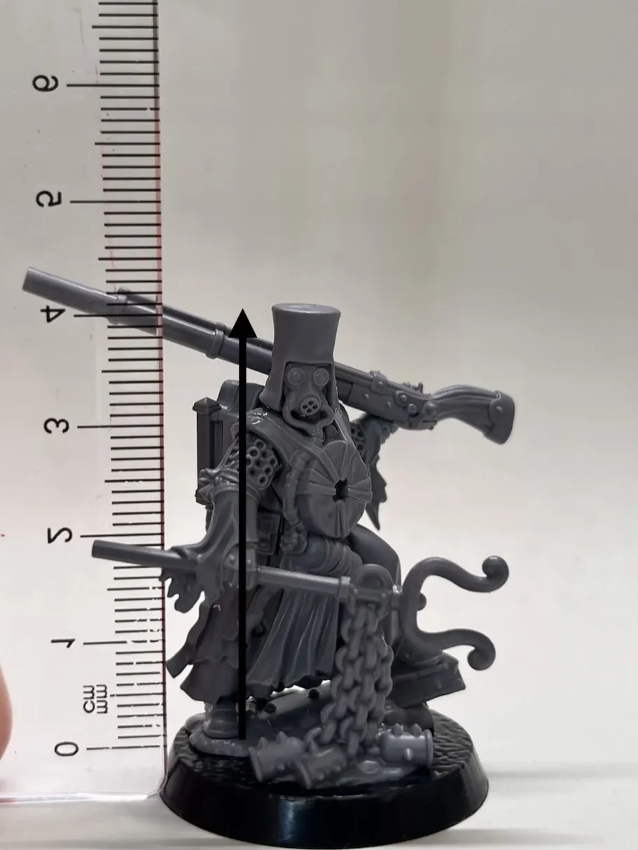 Plastic Castigator beside a ruler, measuring roughly 40 mm